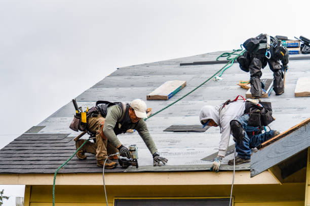 Professional Roofing technician working in Rialto, CA